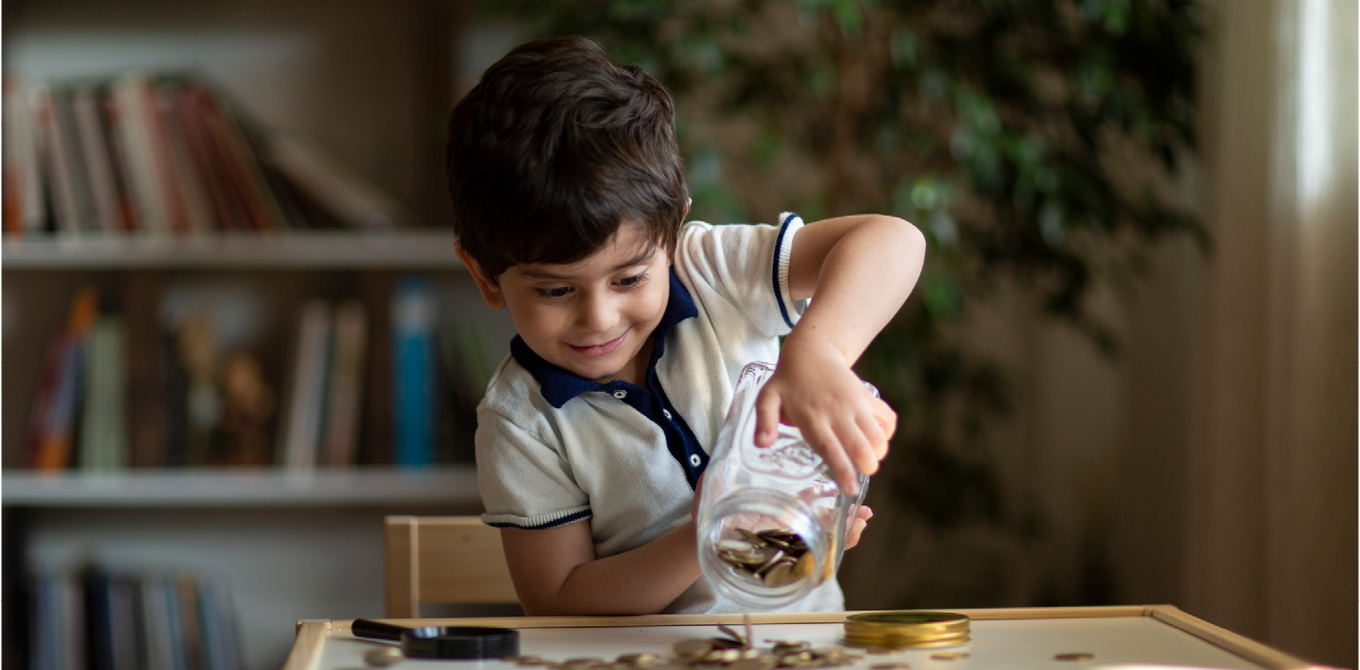 a kid pouring out a jar of loose change