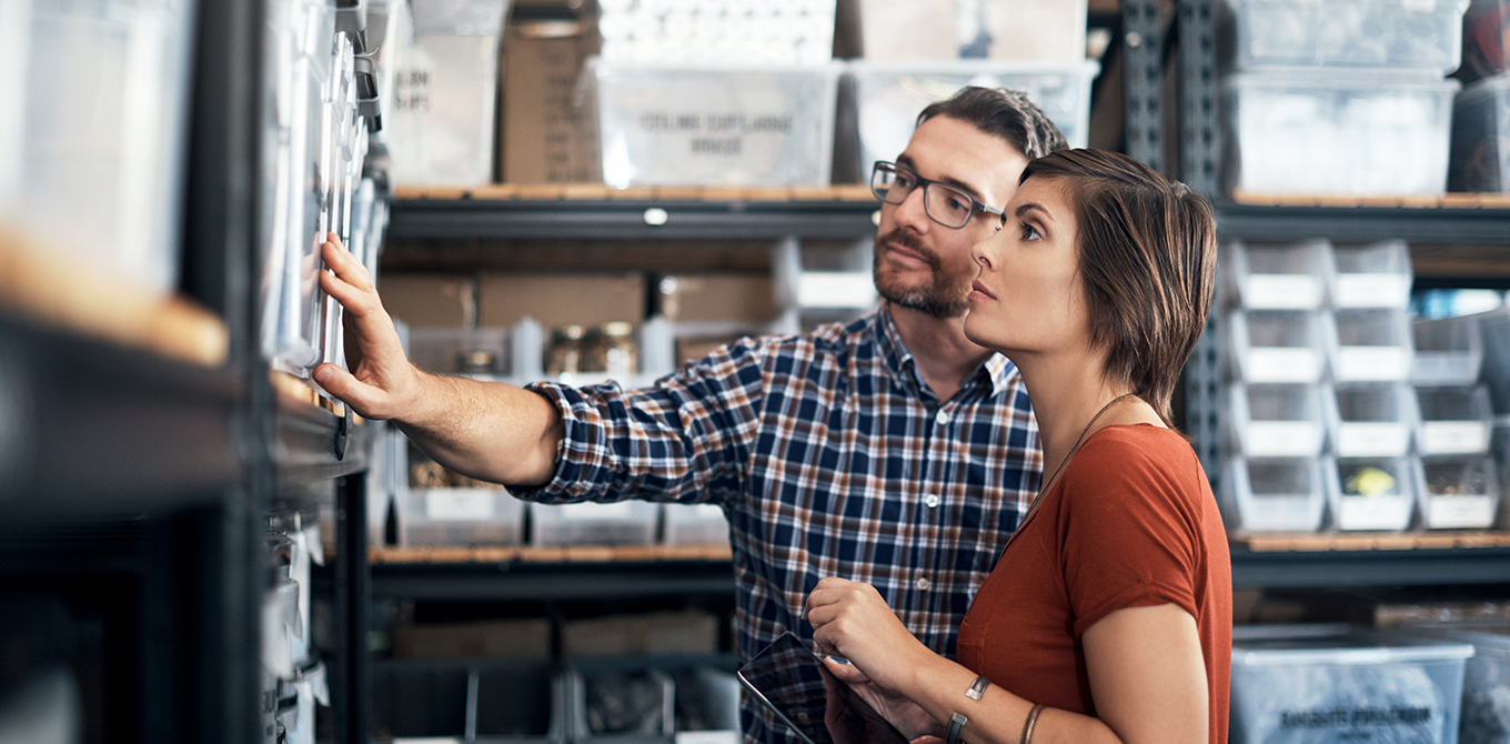Two colleagues looking at inventory