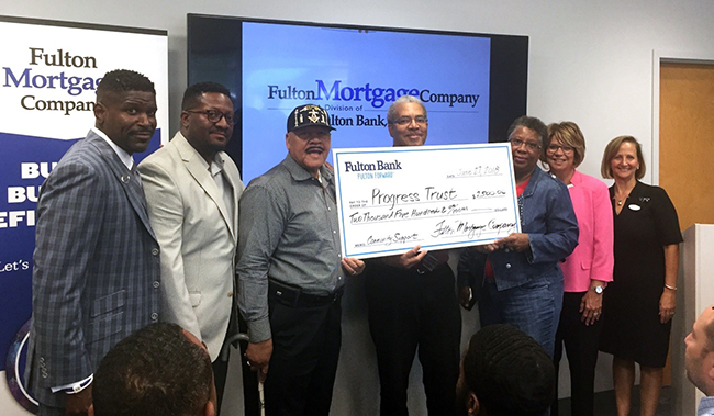 Check presentation at new Fulton Mortgage Company location in North Philadelphia